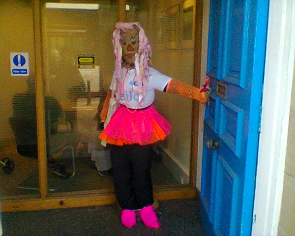 girl scarecrow outside the bank